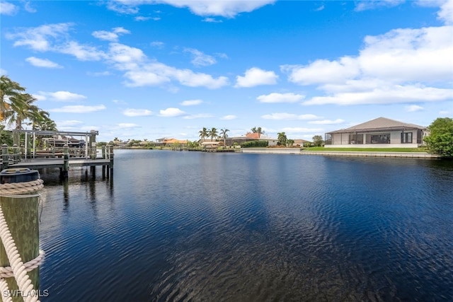 view of water feature with a dock