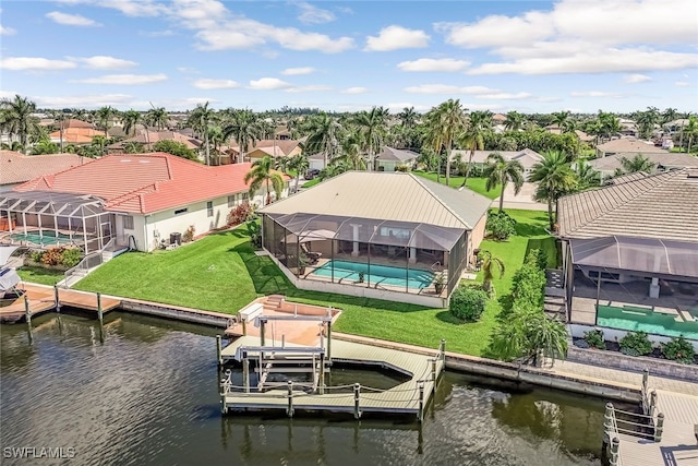 aerial view featuring a water view and a residential view