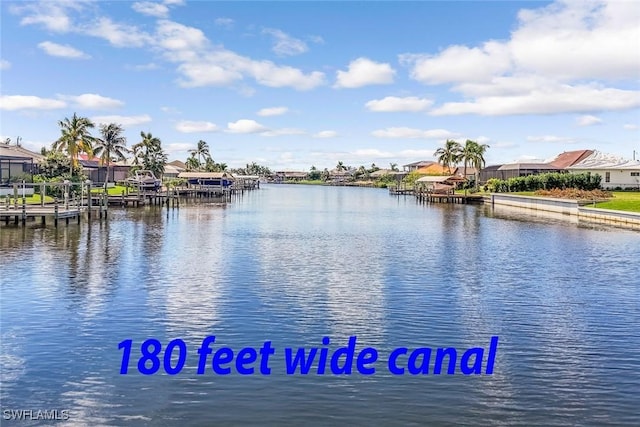 view of water feature featuring a boat dock and a residential view