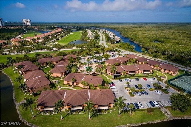 aerial view with a water view and a residential view