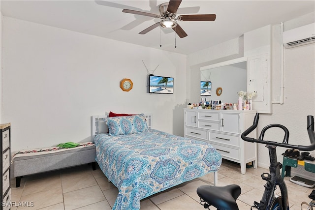 bedroom with a wall mounted air conditioner, light tile patterned flooring, and a ceiling fan