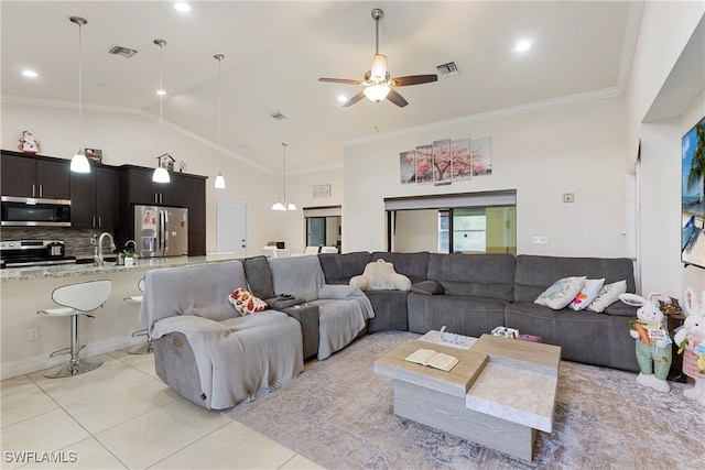 living room featuring ornamental molding, light tile patterned flooring, and visible vents