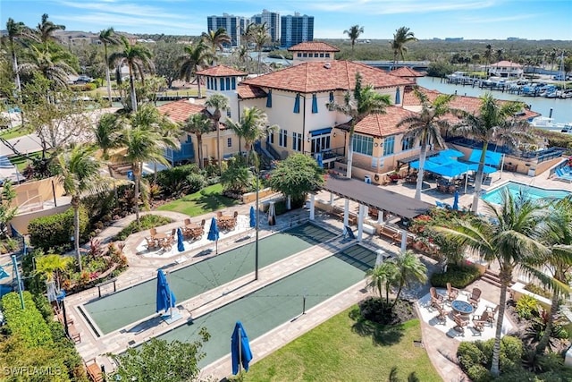 birds eye view of property featuring a water view