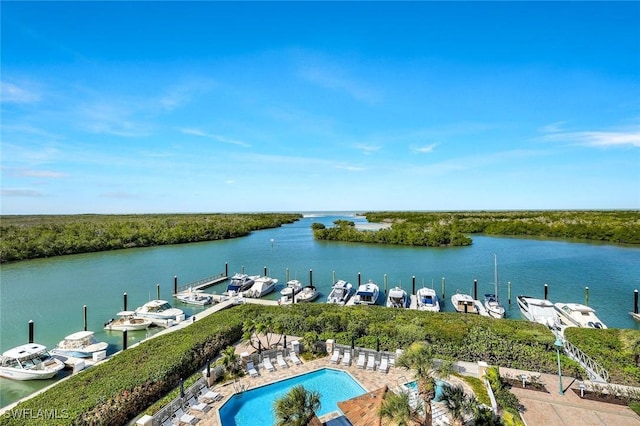 dock area featuring a water view, a patio, and a community pool