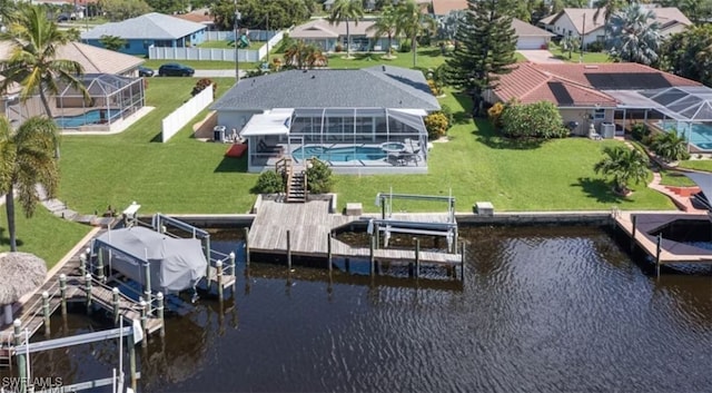 exterior space featuring a residential view and a water view