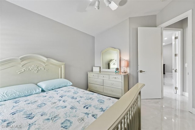 bedroom with lofted ceiling, marble finish floor, ceiling fan, and baseboards