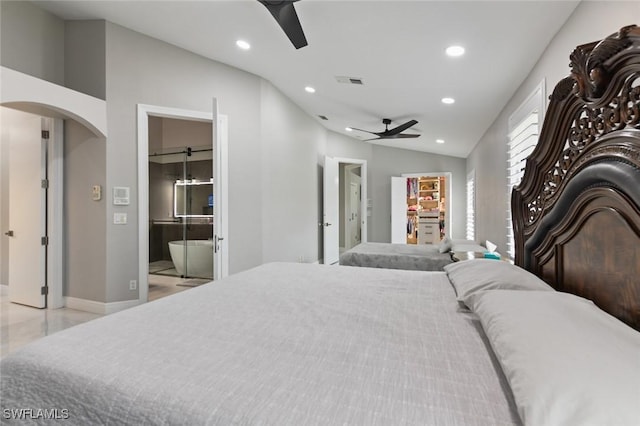 bedroom featuring visible vents, arched walkways, baseboards, lofted ceiling, and recessed lighting