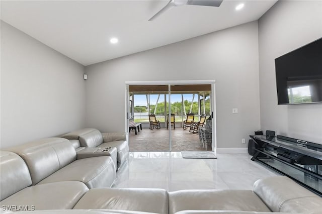 living area featuring ceiling fan, baseboards, vaulted ceiling, and recessed lighting