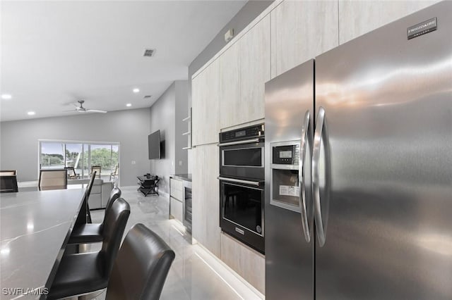 kitchen featuring dobule oven black, visible vents, modern cabinets, marble finish floor, and stainless steel refrigerator with ice dispenser