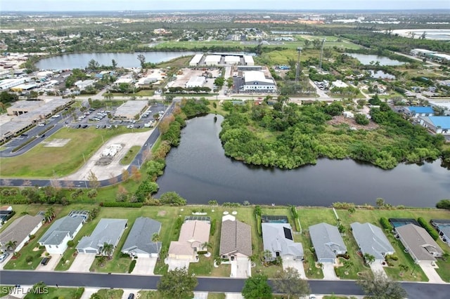 aerial view featuring a water view and a residential view