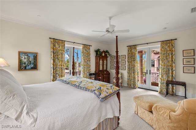 carpeted bedroom with ornamental molding, access to outside, french doors, and multiple windows