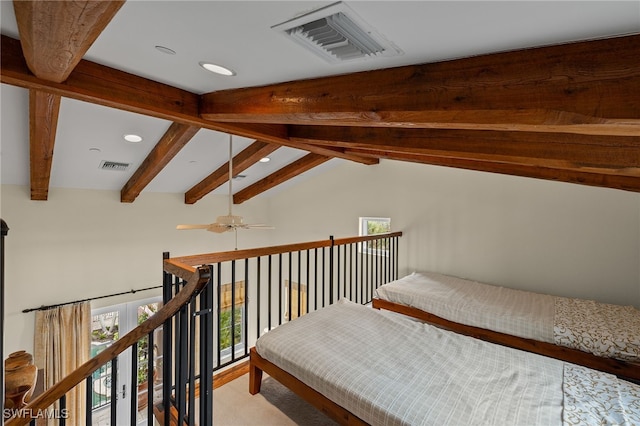 interior space featuring vaulted ceiling with beams, visible vents, and recessed lighting