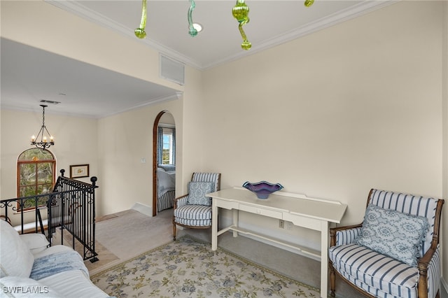 sitting room featuring visible vents, arched walkways, carpet, crown molding, and an upstairs landing