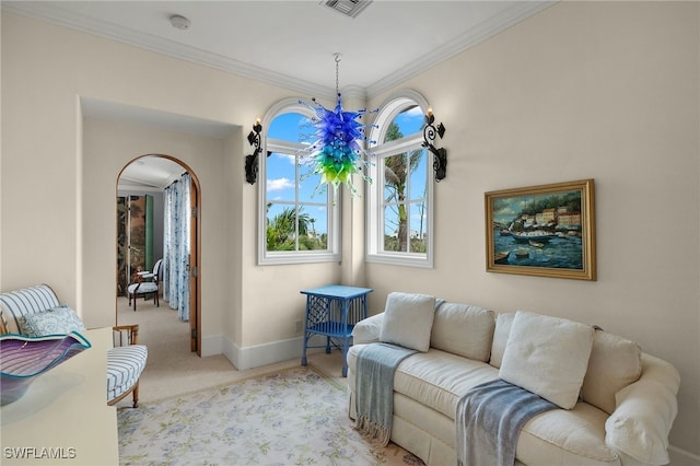 carpeted living room with baseboards, visible vents, arched walkways, and ornamental molding