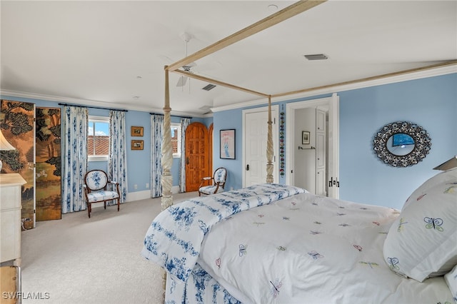 carpeted bedroom featuring visible vents, crown molding, and baseboards