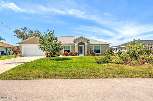 ranch-style house featuring a garage, a front yard, concrete driveway, and stucco siding