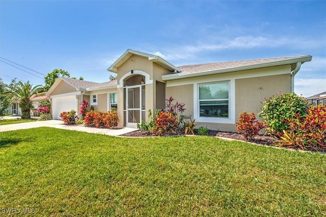 single story home with driveway, a front yard, an attached garage, and stucco siding