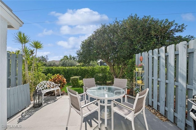 view of patio / terrace with fence and outdoor dining area