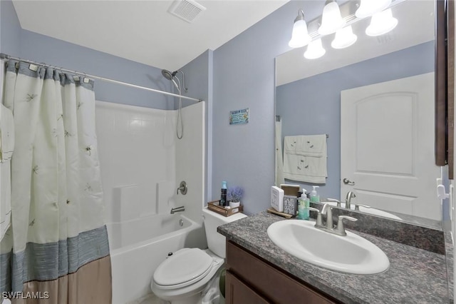 full bath with visible vents, vanity, toilet, and shower / bath combo with shower curtain