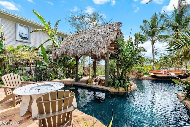 outdoor pool featuring a patio