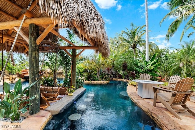 pool with a patio area