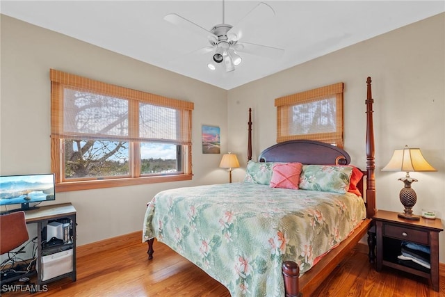 bedroom featuring wood finished floors and ceiling fan