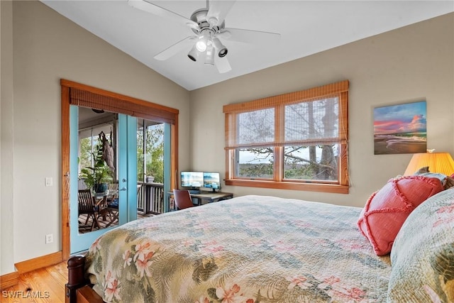 bedroom with wood finished floors, baseboards, lofted ceiling, ceiling fan, and access to outside