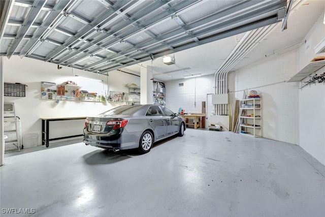 4811 Island Pond Ct Unit 705, Bonita Springs, FL 34134 - garage featuring a garage door opener