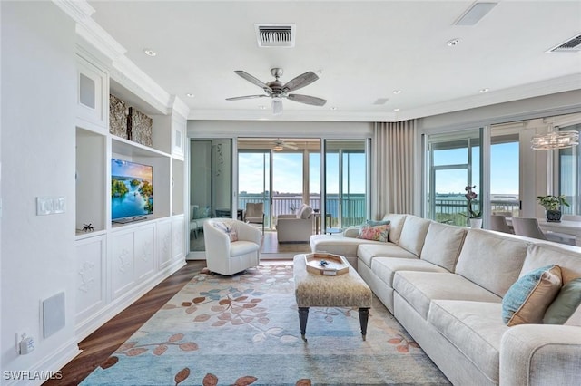 4811 Island Pond Ct Unit 705, Bonita Springs, FL 34134 - living room with recessed lighting, visible vents, dark wood-style floors, and ornamental molding
