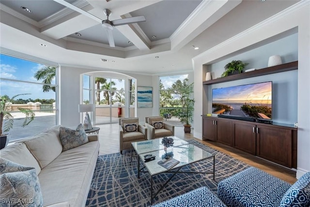 4811 Island Pond Ct Unit 705, Bonita Springs, FL 34134 - living room featuring ceiling fan, wood finished floors, and crown molding