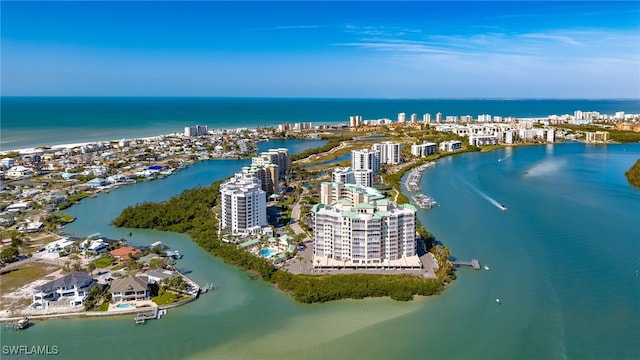 drone / aerial view with a view of city and a water view