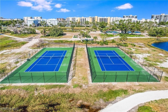 birds eye view of property featuring a city view