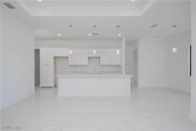 interior space featuring visible vents, a sink, and recessed lighting