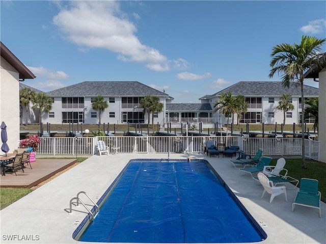 pool featuring fence