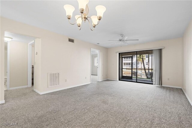 719 SW 47th Ter Unit 101, Cape Coral, FL 33914 - spare room featuring a chandelier, carpet flooring, baseboards, and ceiling fan