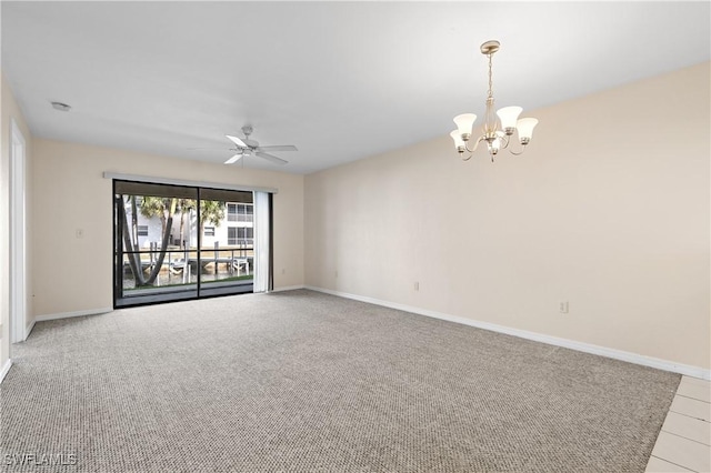 unfurnished room featuring baseboards, carpet flooring, and ceiling fan with notable chandelier