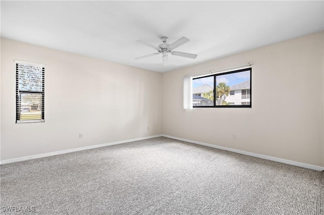 719 SW 47th Ter Unit 101, Cape Coral, FL 33914 - empty room featuring a ceiling fan, baseboards, and carpet