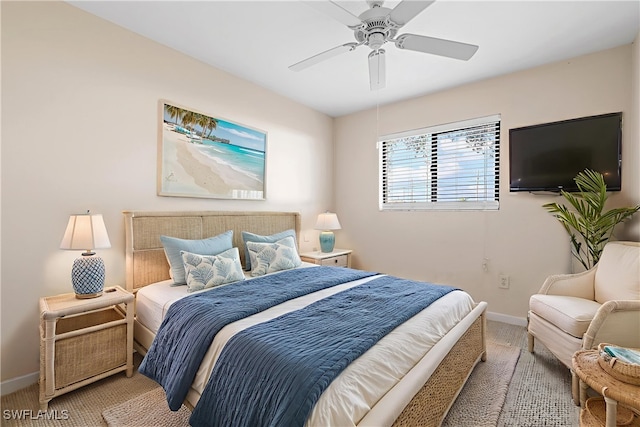 719 SW 47th Ter Unit 101, Cape Coral, FL 33914 - carpeted bedroom featuring baseboards and ceiling fan