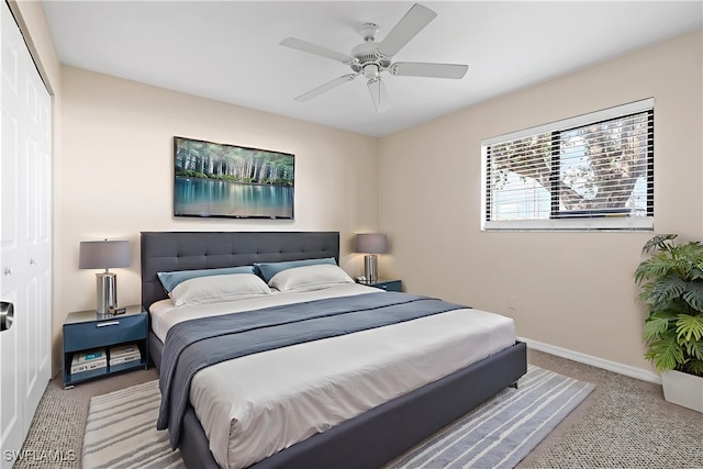 719 SW 47th Ter Unit 101, Cape Coral, FL 33914 - bedroom with carpet, a closet, baseboards, and ceiling fan