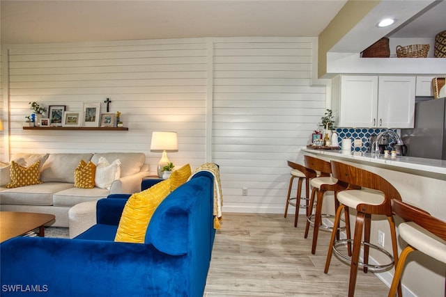 living room featuring light wood-style flooring