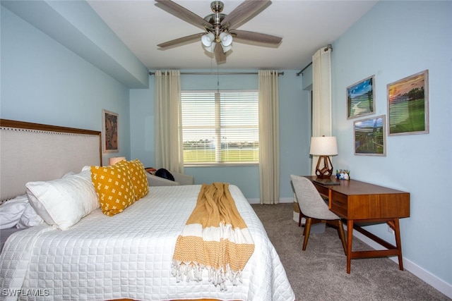 bedroom with carpet flooring, a ceiling fan, and baseboards