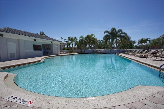 pool with a patio