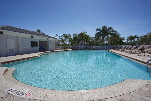 8106 Queen Palm Ln Unit 115, Fort Myers, FL 33966 - community pool with a patio area