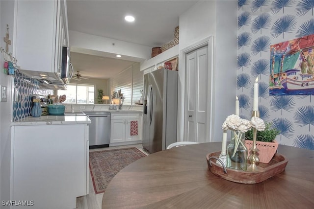 8106 Queen Palm Ln Unit 115, Fort Myers, FL 33966 - kitchen featuring appliances with stainless steel finishes, white cabinetry, light countertops, a ceiling fan, and recessed lighting