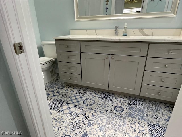 8106 Queen Palm Ln Unit 115, Fort Myers, FL 33966 - bathroom with toilet and vanity