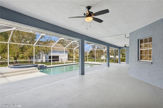 view of pool with a patio, ceiling fan, an outdoor structure, and a storage shed