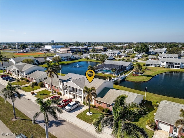 aerial view with a water view and a residential view