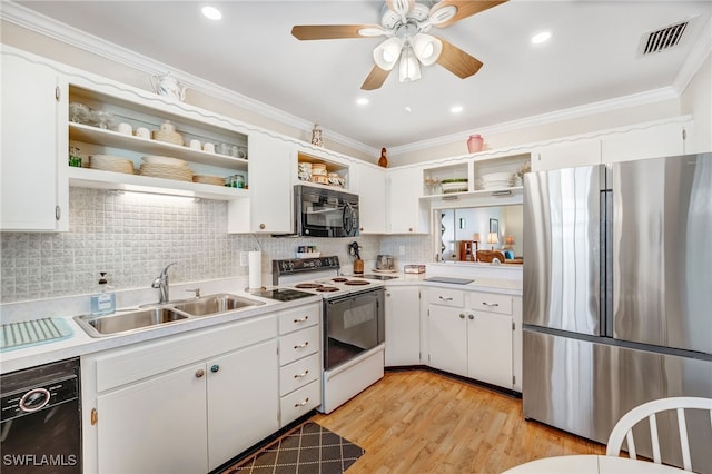 kitchen featuring open shelves, a sink, visible vents, ornamental molding, and black appliances