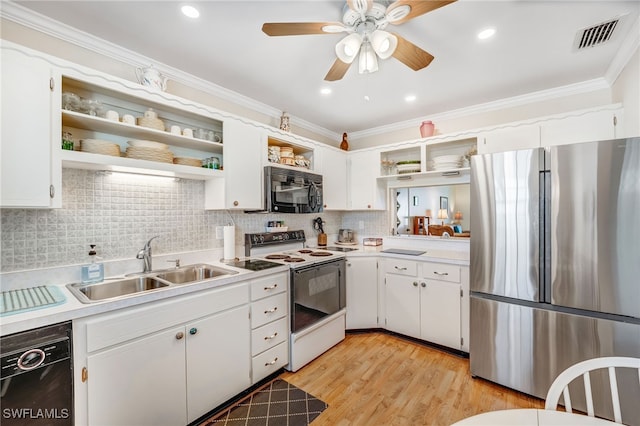 1515 Myerlee Country Club Blvd Unit 6, Fort Myers, FL 33919 - kitchen with open shelves, ornamental molding, a sink, visible vents, and black appliances