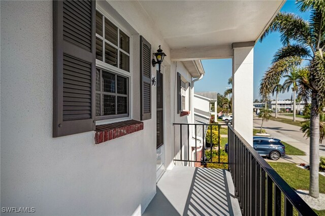 balcony featuring a porch